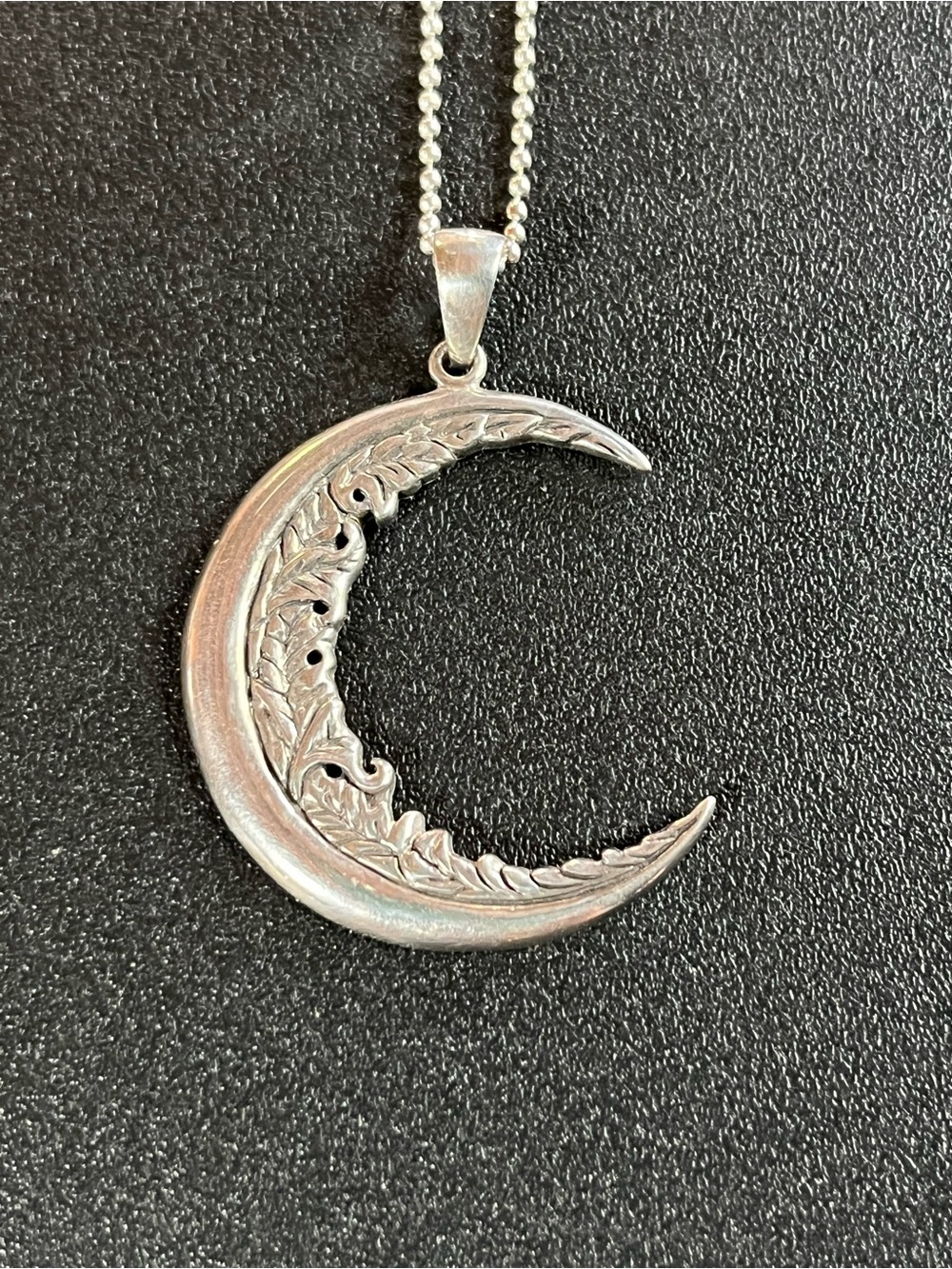Sterling silver crescent moon on a 925 beaded chain. 18”.